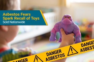 Child holds Orb Funkee Squeeze Toy that was recalled for asbestos contamination